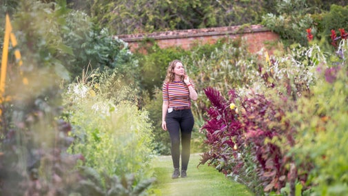 Visitor exploring the Walled Garden at Osterley Park and House, London